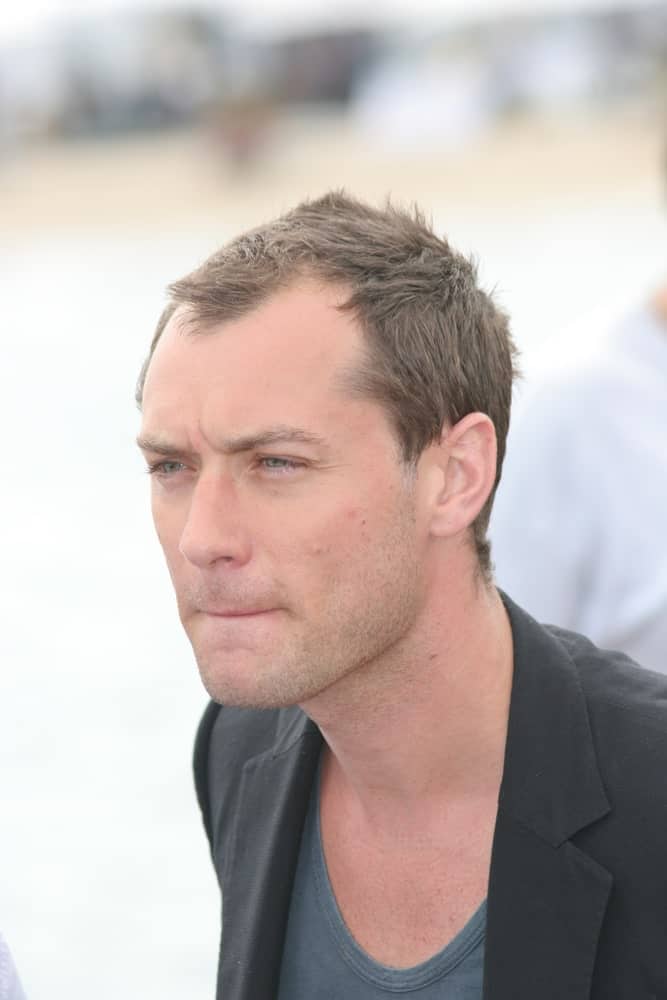 The talented actor Jude Law sported a very short and flattened hairstyle almost like it just grew from a buzz cut at the The Day After Peace photocall at Majestic Beach last May 19, 2008 in Cannes, France.