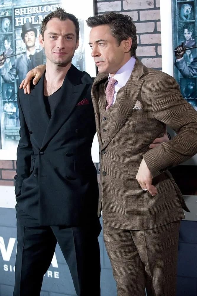 Jude Law dyed his hair black and styled up with a spike when he posed for a photo with co-star Robert Downey Jr for the New York premiere of their movie "Sherlock Holmes" in 2009.