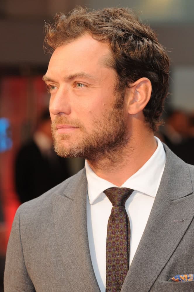 Jude Law was ruggedly handsome with his short beard that goes perfectly well with his short tossed up hair at the World Premiere of Anna Karenina at the Odeon Leicester Square in London last September 4, 2012.