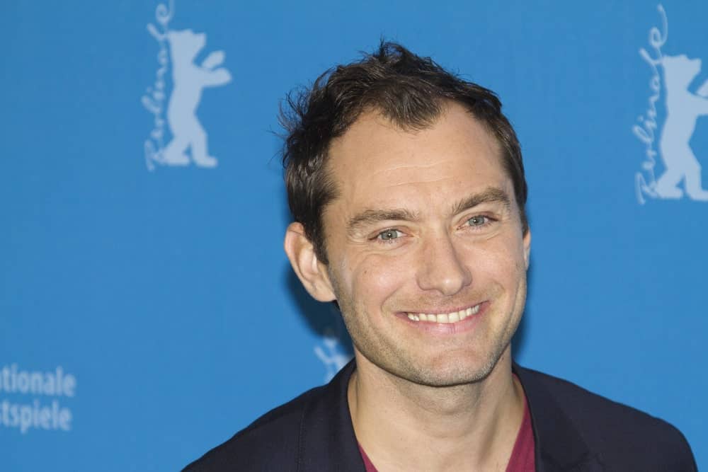 Actor Jude Law sported a raven tossed up hairstyle when he attended the 'Side Effects' Photocall during the 63rd Berlinale Festival at the Grand Hyatt Hotel on February 12, 2013 in Berlin, Germany.