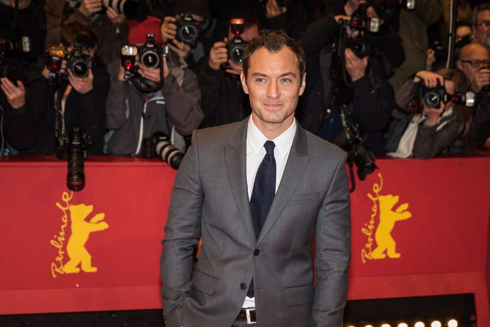 Last February 16, 2016, Actor Jude Law kept it classy and sexy in his dark gray suit and short hair with curly spikes at the 'Genius' premiere during the 66th Berlinale International Film Festival.