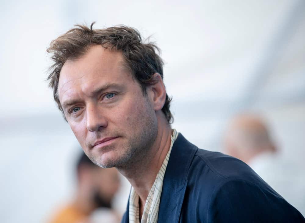Jude Law sported a short and tousled hairstyle with highlights when he attended "The New Pope" photocall during the 76th Venice Film Festival at Sala Grande on September 01, 2019 in Venice, Italy.
