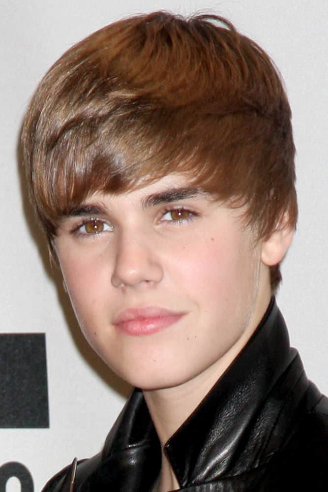Teen heartthrob Justin Bieber sporting a shorter shaggy 'do with fringe bangs in the Press Room of the 2010 American Music Awards at Nokia Theater in Los Angeles, CA.