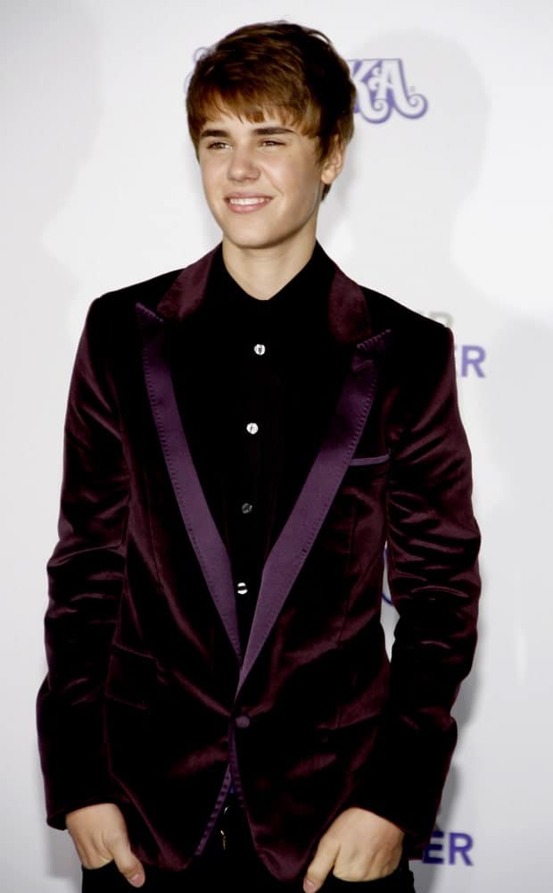During the Los Angeles premiere of "Justin Bieber: Never Say Never" held on February 8, 2011, the singer showcased his bowl cut hairstyle that's tousled a bit for a more natural look.