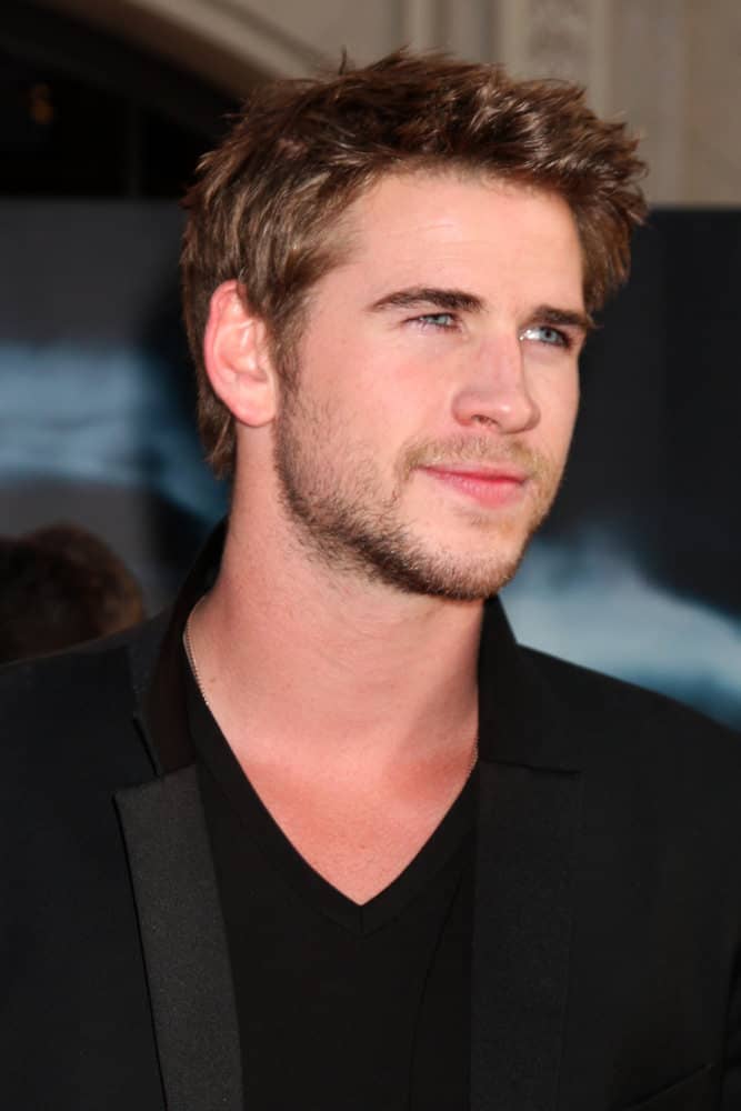 Liam Hemsworth trimmed his hair short when he appeared at the 2011 world premiere of "Thor" at the El Capitan theater in Los Angeles, CA.