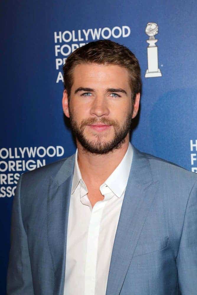 Liam Hemsworth cropped his hair short but kept a full beard on at the Hollywood Foreign Press Association's 2013 Installation Luncheon, Beverly Hilton, Beverly Hills, CA.