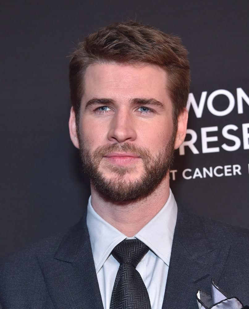The actor had his short brunette hair brushed to the side during the Women's Cancer Research Fund's An Unforgettable Evening on February 28, 2019. It was complemented with a tight beard that gave his face a character.