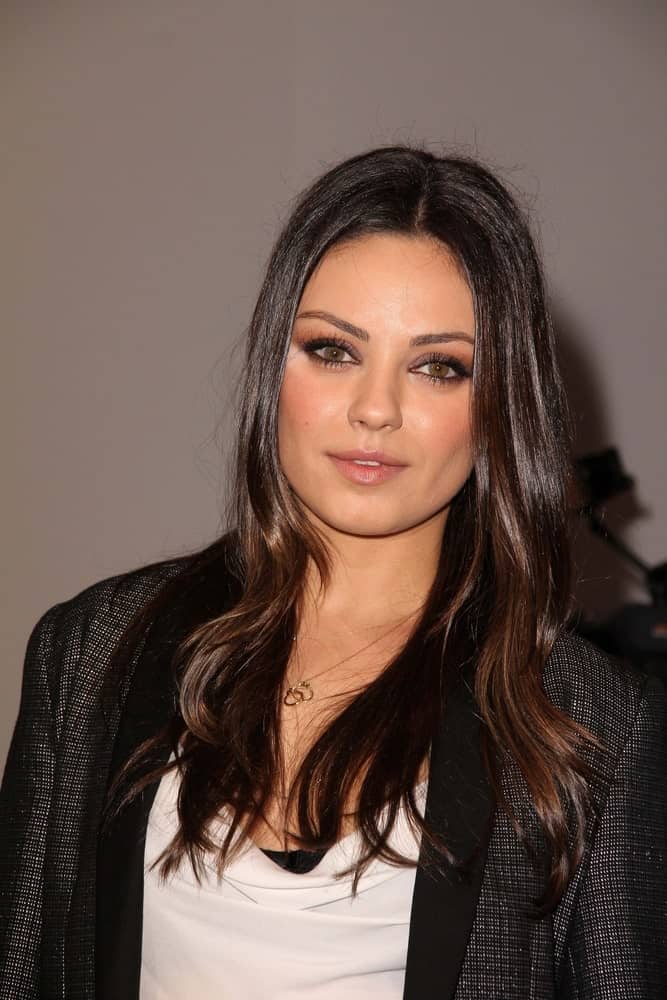 Mila Kunis was at the Jaguar Land Rover Preview Reception for the 2011 Los Angeles Auto Show in Beverly Hills last November 15, 2011. she wore a fashion-forward smart casual ensemble complemented by her long and loose straight hair with highlights.