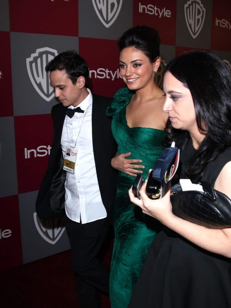 Mila Kunis was at the 12th Annual WB-In Style Golden Globe After Party last January 16, 2011 in Beverly Hills wearing a sophisticated green gown matched with her upstyle with a slight pompadour look.