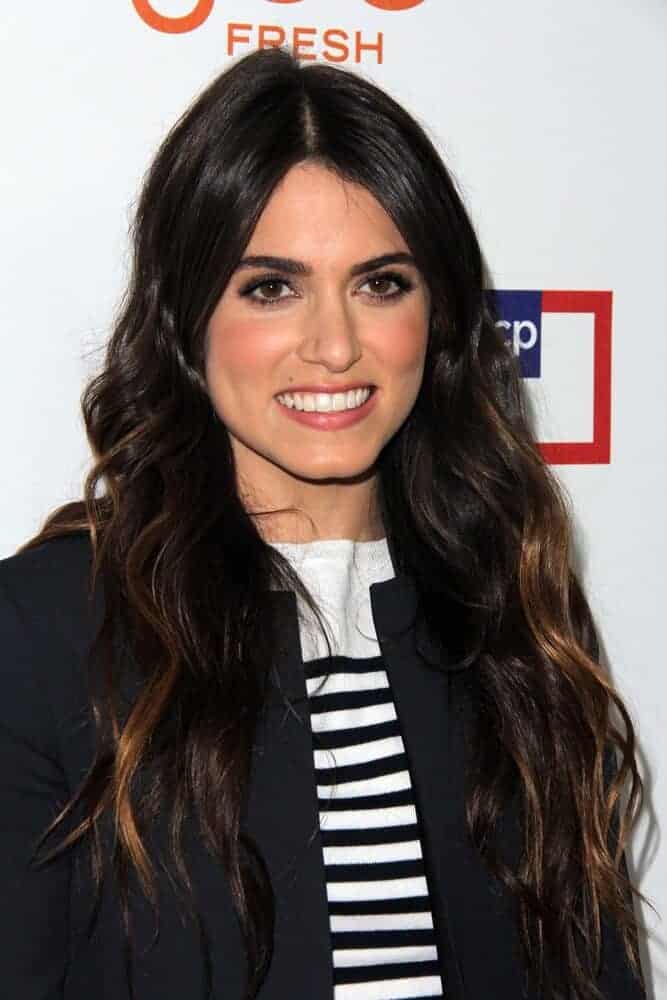 Last March 7, 2013, Nikki Reed arrived at the introduction of Joe Fresh at JCP at JCP Pop Up Store in her casual but fashionable outfit paired with her thick and wavy hair in a loose style.