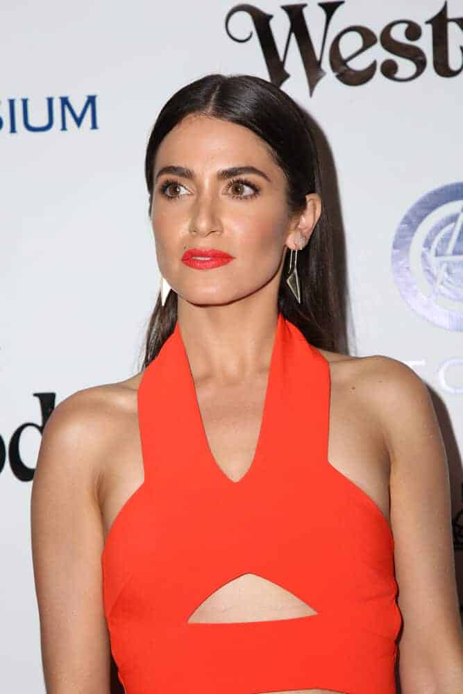 Last January 9, 2016, Nikki Reed overflowed with elegance and confidence during The Art of Elysium Ninth Annual Heaven Gala with her sleek and straight, center-parted hairstyle.