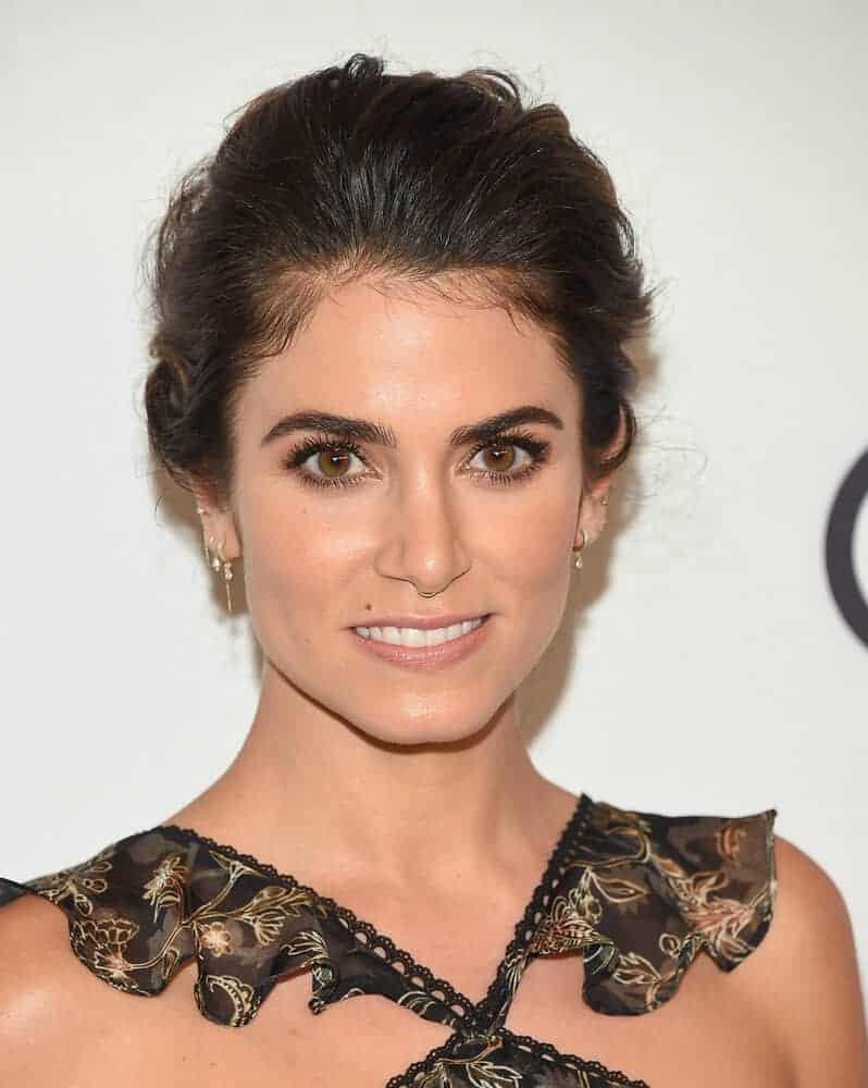 Nikki Reed sported a voluminous, tousled bun during the Variety's Power Of Women: Los Angeles, October 13, 2017. 