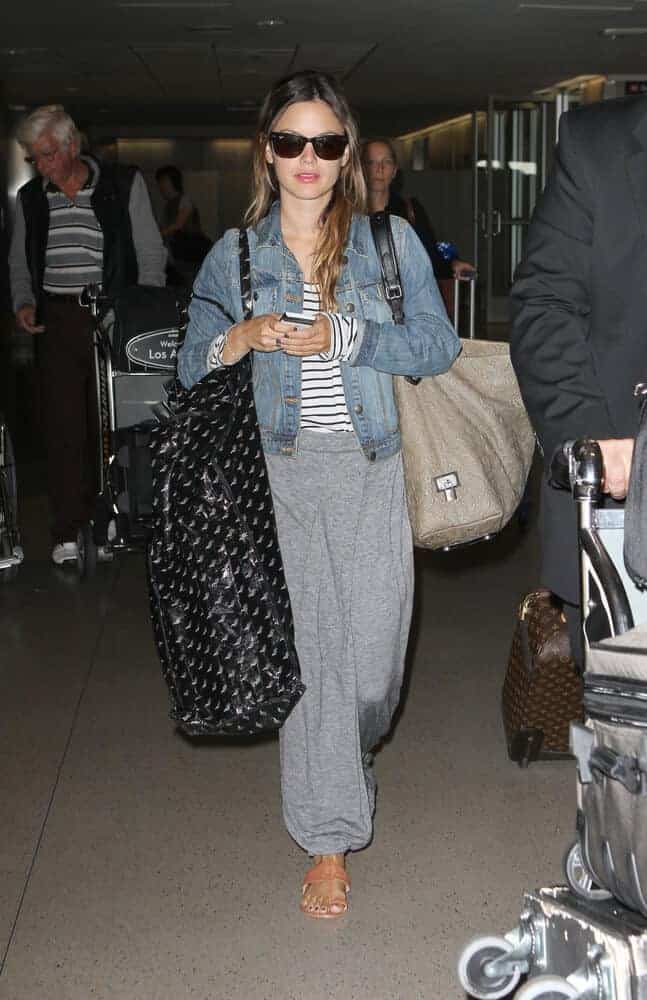 Rachel Bilson with a center-parted bedroom hair as seen at LAX Airport, September 14 2010 in Los Angeles, California.
