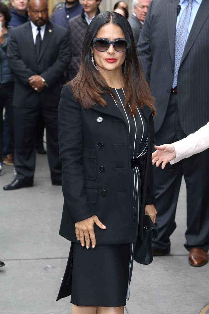 Salma Hayek was seen last April 21, 2017, in New York City. She was in a formal attire that goes quite well with her long highlighted hair that is parted in the middle.