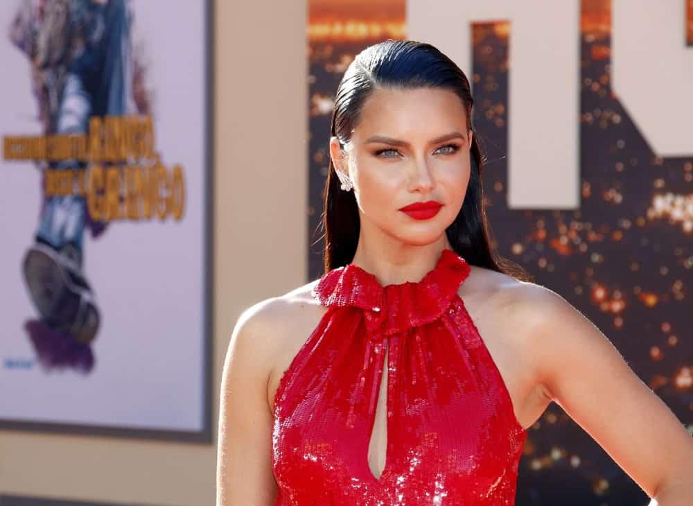 Adriana Lima was at the Los Angeles premiere of 'Once Upon a Time In Hollywood' held at the TCL Chinese Theatre IMAX in Hollywood last July 22, 2019 with a stunning red dress and a dark long straight hair slicked back.