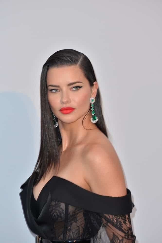 May 23, 2019 was when Adriana Lima attended the amfAR's Gala Cannes event at the Hotel du Cap d'Antibes with long side-parted black hair to complement her black sheer dress.