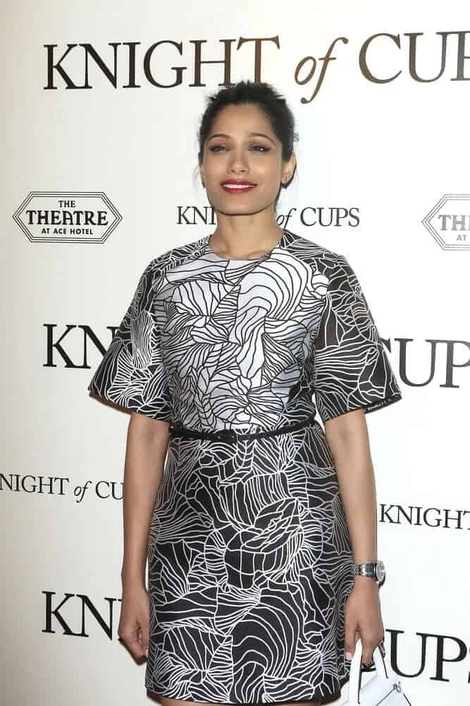 During the premiere of Broad Green Pictures' "Knight of Cups" last March 1, 2016, the actress wore a detailed two-toned dress with a casual upstyle for an effortlessly beautiful look.