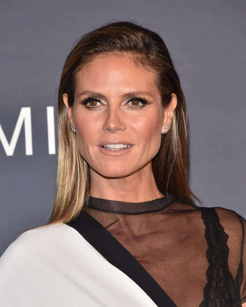 Heidi Klum upgraded her usual blonde look by going brunette during the InStyle Awards last October 23, 2017. With her straight and dark-colored hair flaunted, a different kind of aura was felt.