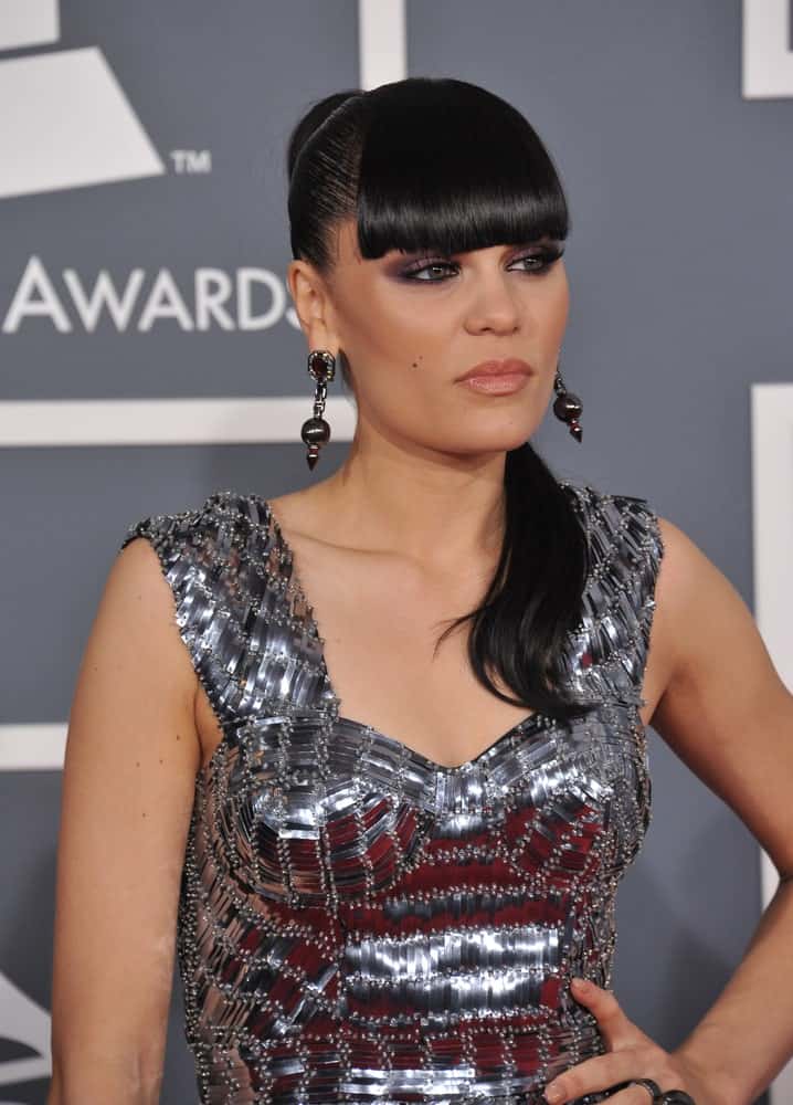 Jessie J wore a sophisticated and slick high ponytail with eye-skimmer bangs at the Grammy Awards 2012 last February 12, 2012 in Los Angeles.