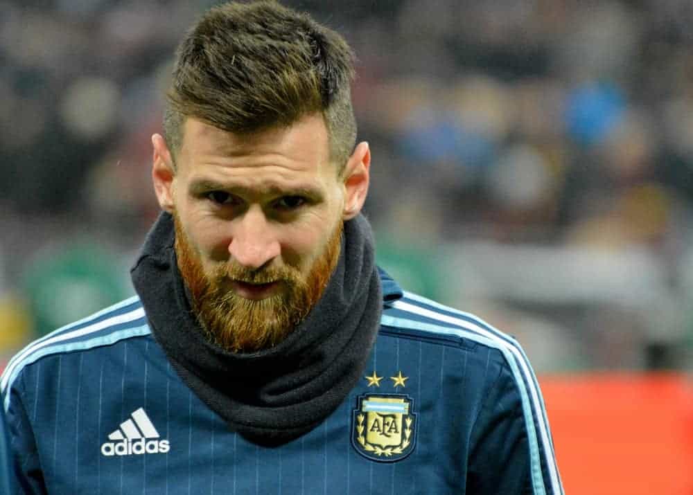 On November 11, 2017, Argentina national football team captain Lionel Messi readied before the match against Russia in Moscow. He wore his uniform with a full and thick beard topped with a spiked fade haircut.
