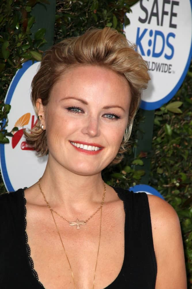 Malin Akerman was at the Safe Kids Day LA last April 26, 2015 in Los Angeles wearing a bright smile paired with her short bob styled to a half-up semi-pompadour look.