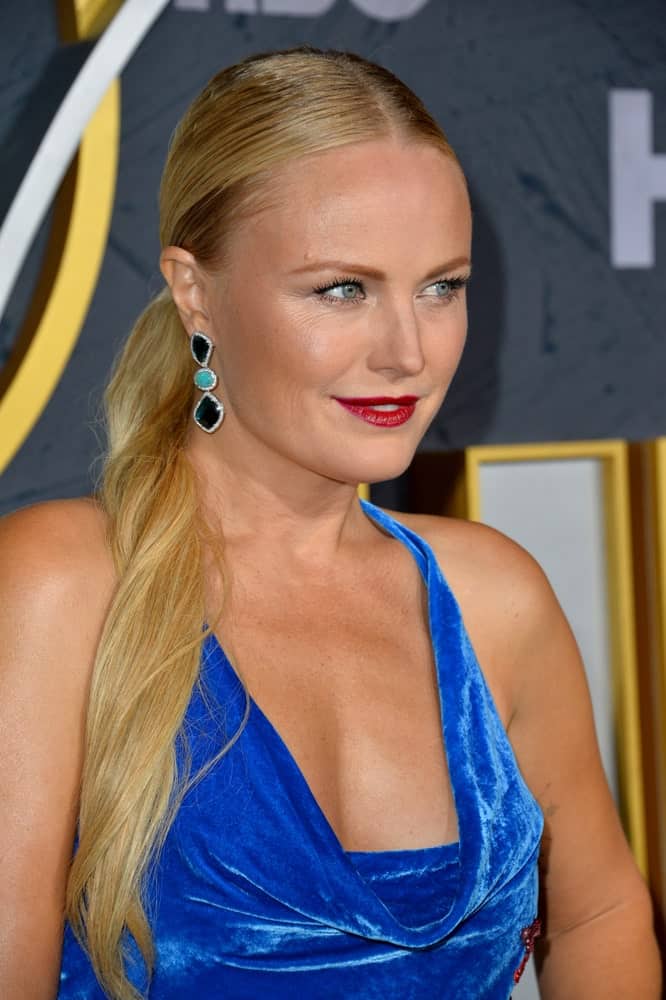 Malin Akerman attended the HBO post-Emmy Party at the Pacific Design Centre last September 23, 2019 wearing bold lips with her blue velvet dress and slick blond ponytail.