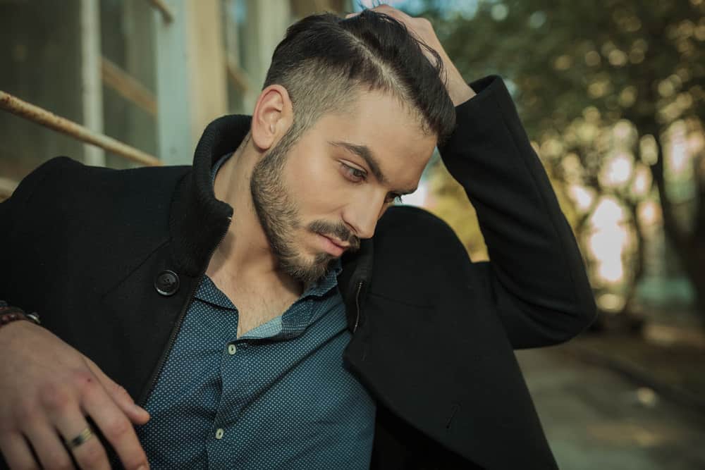 Man with side-part fade haircut