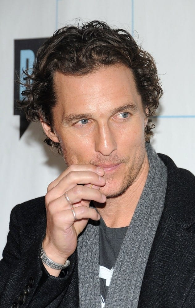 Matthew McConaughey wore a relaxed and casual smart ensemble with a gray scarf at the BRAVO'S Upfront Party, Skylight Studios in New York last March 10, 2010. He paired this with his iconic messy wavy hair with a slick finish.