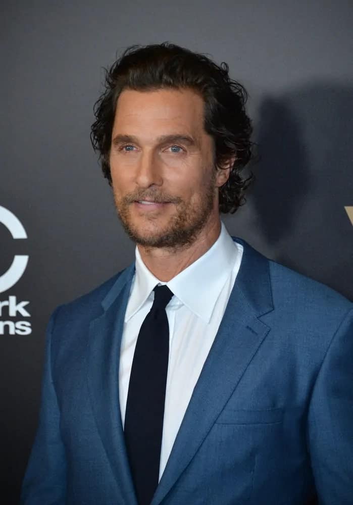 Talented actor Matthew McConaughey was at the 2016 Hollywood Film Awards at the Beverly Hilton Hotel wearing a dapper blue suit with his wavy long hair pushed back with a slight pompadour style.