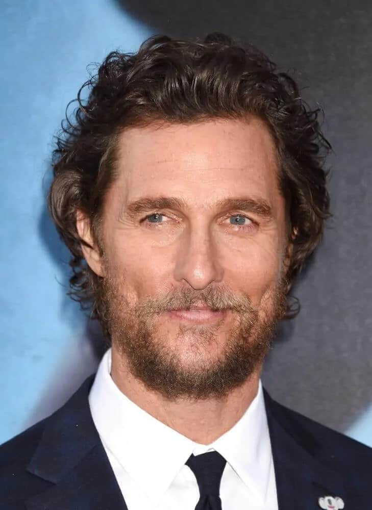 Matthew McConaughey's iconic beach curls were tousled for a bit of volume that went well with his scruffy beard during the World Premiere of "Sing" last December 3, 2016.