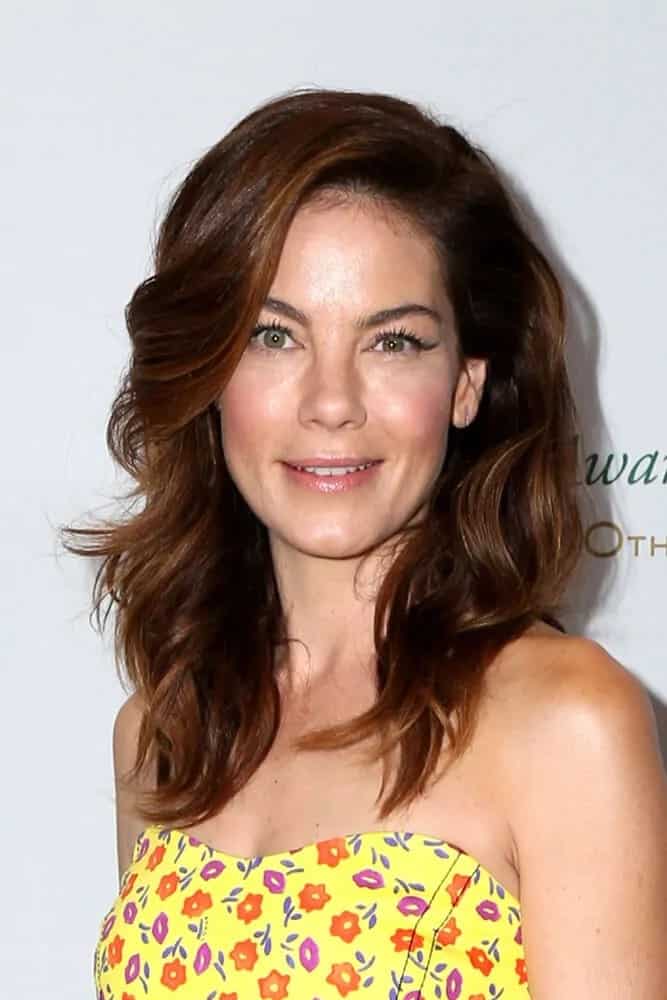 Michelle Monaghan wore a cheerful sunny dress with the sexy side-swept curls at the 40th Anniversary of the Rolex Awards for Enterprise last November 15, 2016.