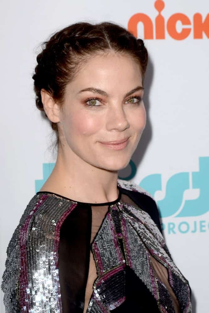 Michelle Monaghan was at the 9th Annual Thirst Gala on the Beverly Hilton Hotel on April 21, 2018 in Beverly Hills, CA. She was wearing a shiny silver sequined dress complemented by her updo braided hair to highlight her neckline.