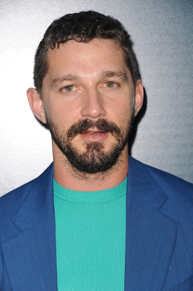Shia LaBeouf was at the Los Angeles premiere of 'The Peanut Butter Falcon' held at the ArcLight Cinemas in Hollywood, USA last August 1, 2019 with a slight fade hairstyle to his short curls and short beard.
