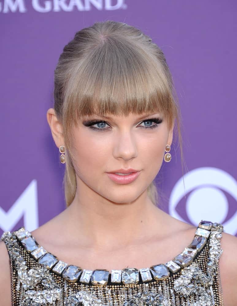 The singer paired her edgy outfit with a sleek ponytail and blunt bangs at the Academy of Country Music Awards 2013 on April 7th.