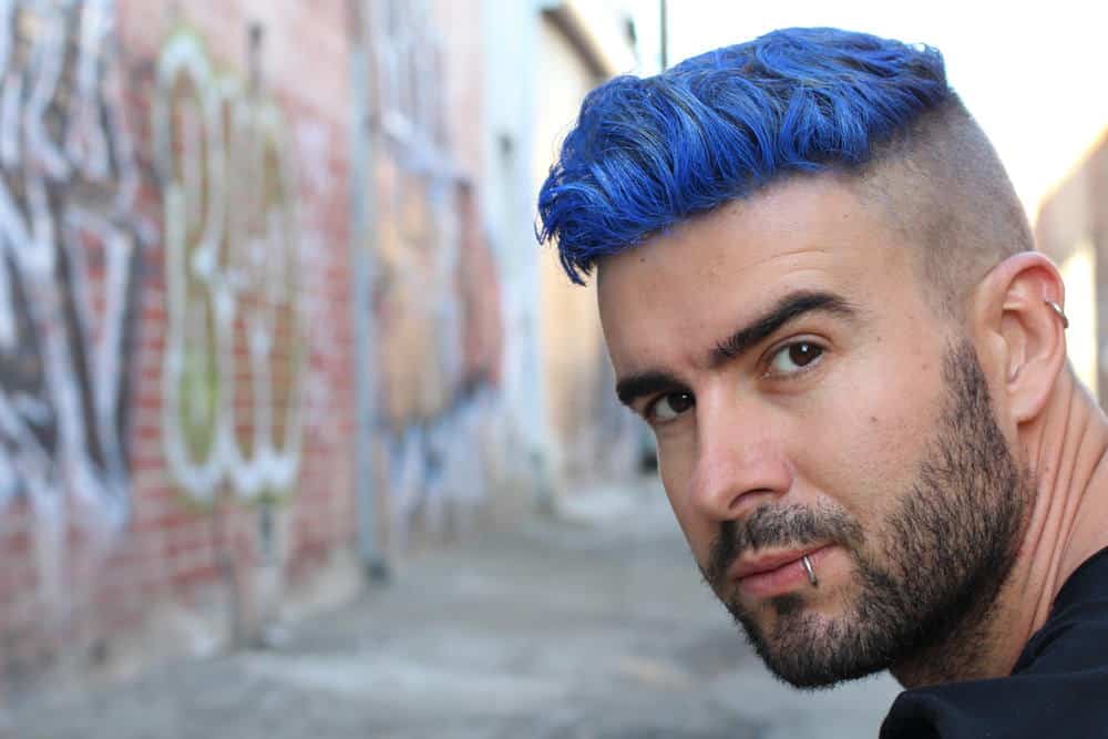 Man with dyed hair and undercut style