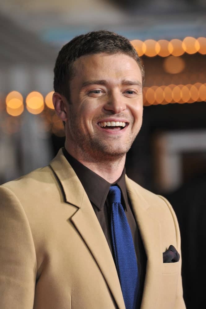 The actor is sporting a charming smile that complements his short tamed hair and five o'clock shadow. This photo was taken last October 20, 2011, during the LA premiere of his movie "In Time".