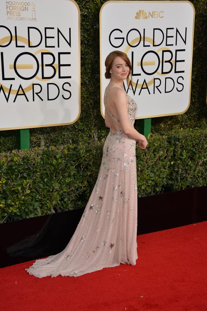On January 8, 2017, Emma Stone showcased her poise and charm with a gorgeous long dress and a loose half-up hairstyle at the 74th Golden Globe Awards at The Beverly Hilton Hotel, Los Angeles.