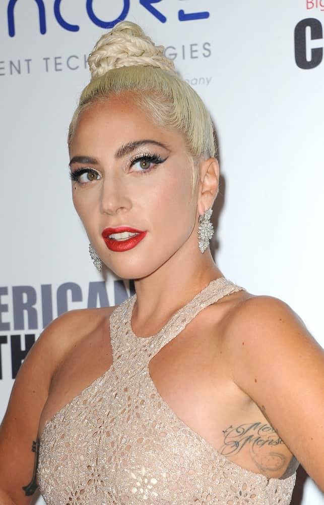 Lady Gaga was quite stunning in her sexy sheer dress and her slick top knot hairstyle that has small braids at the 32nd American Cinematheque Award Presentation Honoring Bradley Cooper held at the Beverly Hilton Hotel in Beverly Hills on November 29, 2018.