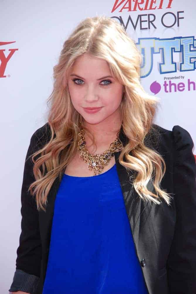 Ashley Benson was at the Variety's 4th Annual Power of Youth event at Paramount Studios on October 24, 2010, in Hollywood, California. She wore a smart casual outfit with her long and wavy sandy blonde hairstyle with a slight tousle and subtle layers.