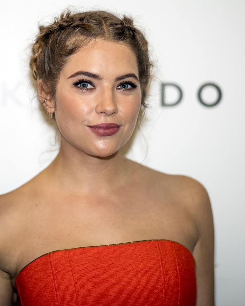 Ashley Benson was at the Restaurant Komodo on January 28, 2016, in Miami, FL, for the presentation of her cover in the Magazine Ocean Drive, 23rd Anniversary Edition. She wore an orange strapless outfit with her sandy blonde braided hairstyle.