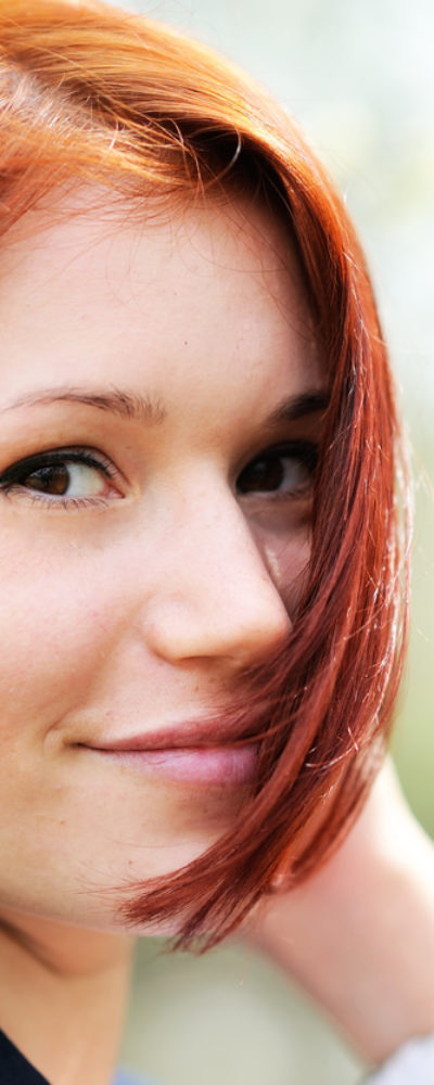 Woman with short red hair
