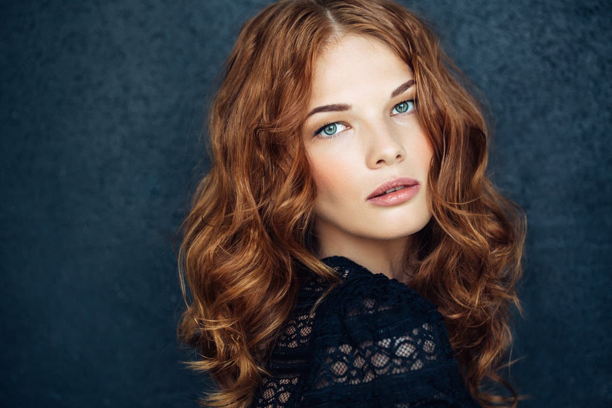 Woman with long wavy red hair