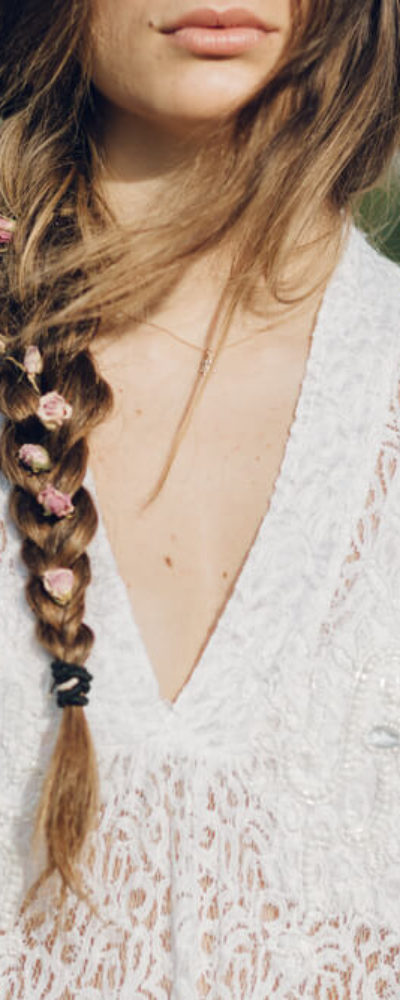 Fishtail braid embellished with little flowers.