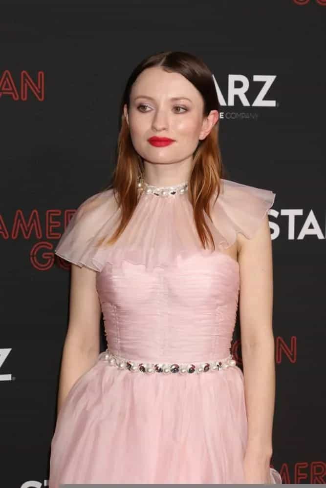 Emily Browning attended the "American Gods" Season 2 Premiere at the Theatre at Ace Hotel on March 5, 2019, in Los Angeles, CA. She was seen wearing a lovely pink dress with her highlighted medium-length dark hairstyle that has layers and a slick finish.