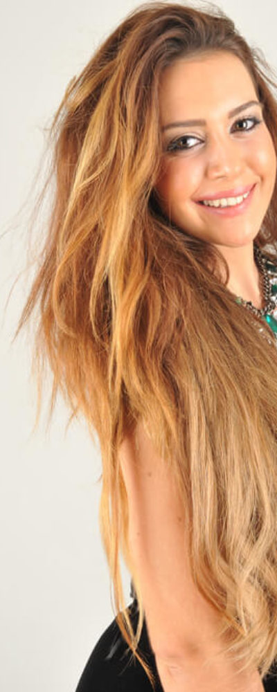 Extra long, layered hair in Blonde.