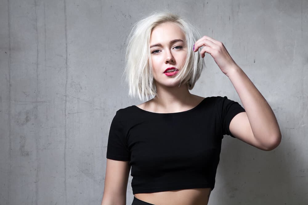 Woman with white, bob cut hairstyle.