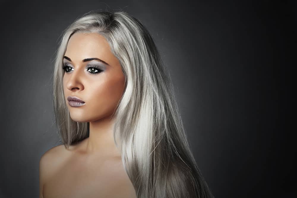 Example of woman with metallic silver hair coloring.