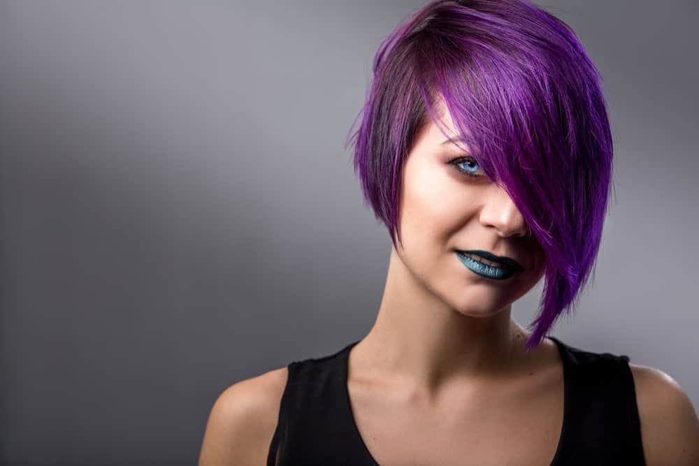 Pixie cut dyed in strong purple color.