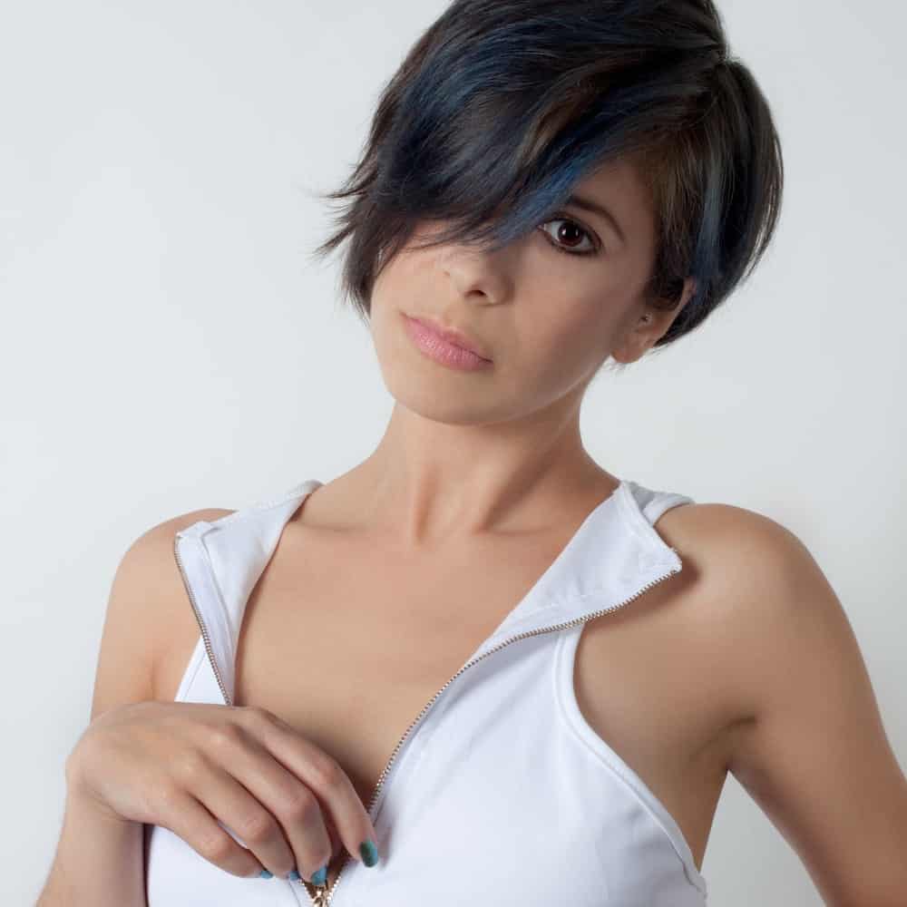 Pixie haircut with disconnecting bangs.