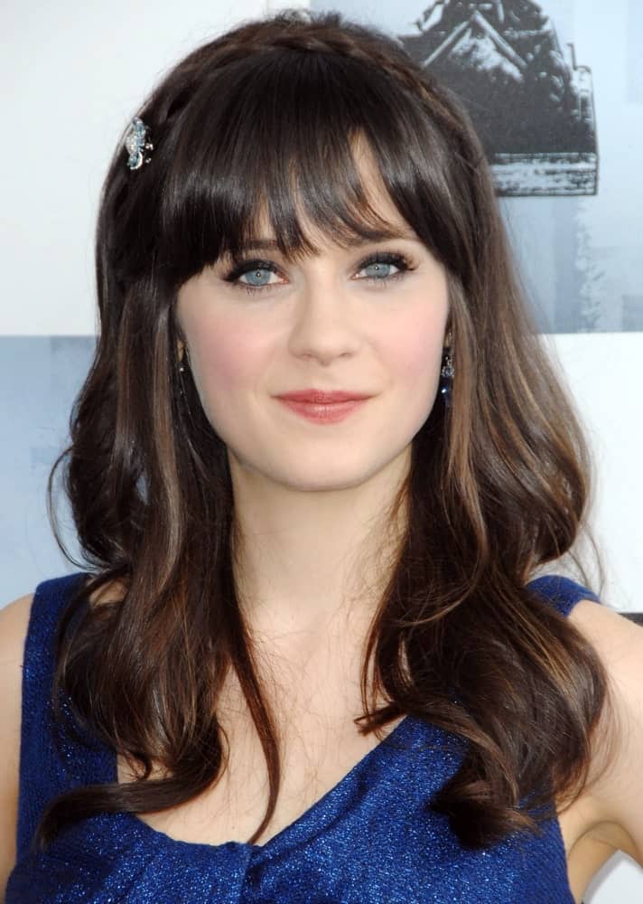 Thick eyelash-skimming bangs are Zoeey Deschanel’s signature look. The beautiful actress has been rocking the look since “New Girl” began and since then, she is hardly seen without her iconic hairstyle.